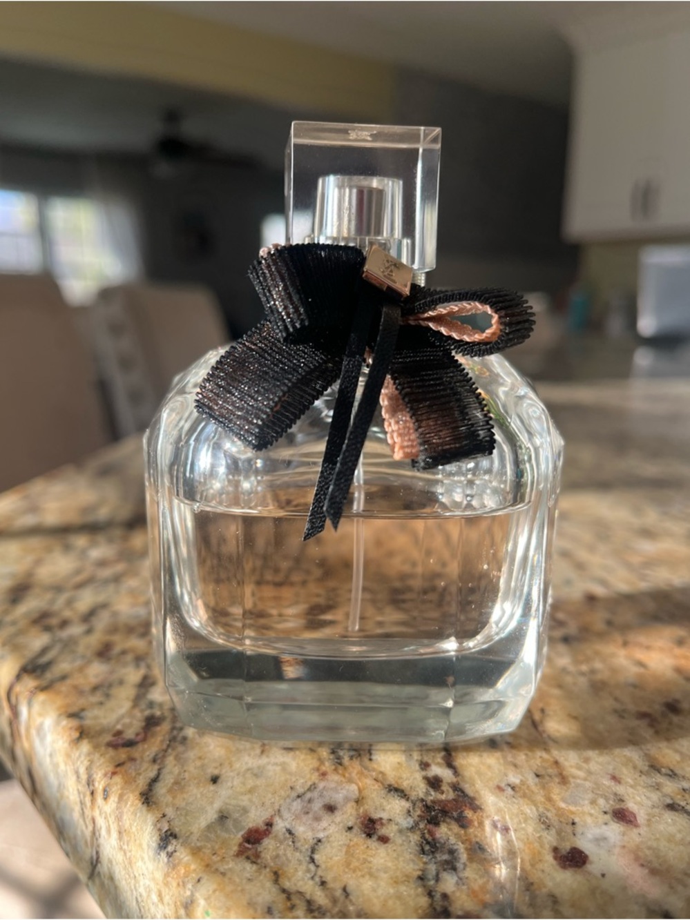 Yves Saint Laurent Clear Glass Perfume Bottle with Black and Blush Bow